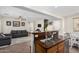 Open kitchen and living room featuring granite countertops and stainless steel sink at 1689 E Elgin St, Gilbert, AZ 85295