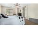 Relaxing main bedroom featuring a window with natural light and a cozy sitting area at 1689 E Elgin St, Gilbert, AZ 85295