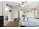 Charming main bedroom with ensuite bathroom and ceiling fan for added comfort at 1689 E Elgin St, Gilbert, AZ 85295