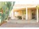 Charming covered backyard patio perfect for outdoor relaxation and entertaining at 17911 N Adobe Mesa Ct, Surprise, AZ 85374