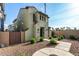 Beautiful house with stucco siding, desert landscaping, and a walkway leading to the front door at 17970 N 114Th Ln, Surprise, AZ 85378