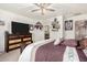 Spacious bedroom offers soft carpet, stylish furniture, neutral colors, and plenty of natural light at 17970 N 114Th Ln, Surprise, AZ 85378