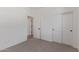 Clean and bright bedroom with a closet and carpet at 18492 E Donato Dr, Gold Canyon, AZ 85118