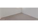 A clean and simple spare bedroom with carpet and fresh paint at 18492 E Donato Dr, Gold Canyon, AZ 85118