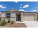 Charming single-story home featuring desert landscaping and a two-car garage at 18492 E Donato Dr, Gold Canyon, AZ 85118