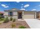 Charming single-story home featuring desert landscaping and a two-car garage at 18492 E Donato Dr, Gold Canyon, AZ 85118