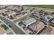 An elevated view of a residential community with solar panels and landscaped yards at 19203 W Jackson St, Buckeye, AZ 85326
