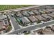 Aerial shot of homes in a well-planned neighborhood with manicured lawns and mature landscaping, next to a field at 19203 W Jackson St, Buckeye, AZ 85326