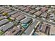 Aerial view of a residential neighborhood featuring single-Gathering homes and a house with a modern pool at 19203 W Jackson St, Buckeye, AZ 85326