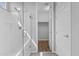 Modern bathroom with a glass-enclosed shower, stainless steel fixtures, and an open entry way to a walk-in closet at 19203 W Jackson St, Buckeye, AZ 85326