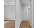 Hallway view showing flooring, closet and bedroom entrances at 19203 W Jackson St, Buckeye, AZ 85326