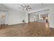 Spacious living area with a ceiling fan and a view of the kitchen at 19203 W Jackson St, Buckeye, AZ 85326