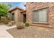 Charming stone and stucco home with manicured landscaping at 2042 W Mark Ln, Phoenix, AZ 85085