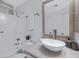 Bathroom featuring white vanity, vessel sink, shower and updated fixtures at 20822 N 34Th Dr, Phoenix, AZ 85027