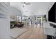 Open-concept living and dining area with modern furnishings and abundant natural light at 20822 N 34Th Dr, Phoenix, AZ 85027