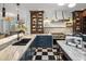 Bright kitchen featuring an island, stainless steel appliances, and marble countertops at 2211 E Camelback Rd # 902, Phoenix, AZ 85016