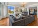 Open concept living space with fireplace, bedroom, and city views at 2211 E Camelback Rd # 902, Phoenix, AZ 85016
