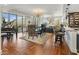 Open living space with sleek furniture, modern lighting, and herringbone floors at 2211 E Camelback Rd # 902, Phoenix, AZ 85016