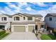 Charming two-story home featuring a two-car garage and inviting front porch at 22771 N 98Th Dr, Peoria, AZ 85383