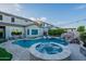 Stunning backyard showcasing a swimming pool, spa, waterfall, and beautifully landscaped surroundings at 22771 N 98Th Dr, Peoria, AZ 85383