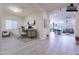 Bright home office featuring neutral paint, large desk with drawers, and tile floors at 22960 N 94Th Ln, Peoria, AZ 85383