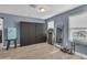 Bonus room features vinyl flooring, large closet space, and bright lighting at 2322 E Mews Rd, Gilbert, AZ 85298