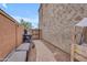 Side yard featuring garbage containers, toys and a walkway at 2322 E Mews Rd, Gilbert, AZ 85298