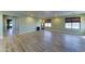 Spacious bonus room features laminate floors and natural light at 23773 W Hammond Ln, Buckeye, AZ 85326