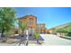 Well-manicured two-story home showcasing landscaping and a long driveway at 23773 W Hammond Ln, Buckeye, AZ 85326