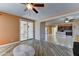 An airy living room featuring tile floors and an open floorplan at 23773 W Hammond Ln, Buckeye, AZ 85326