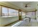 Enclosed patio space offering natural light and tiled floors at 23773 W Hammond Ln, Buckeye, AZ 85326