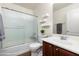 Bathroom with a shower/tub combination, vanity, toilet, and neutral wall colors at 25606 W Satellite Ln, Buckeye, AZ 85326