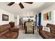 Spacious living room with an open floorplan to the dining room and kitchen at 25606 W Satellite Ln, Buckeye, AZ 85326