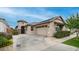 Charming single-story home featuring a stucco exterior, well-manicured landscaping, and a two-car garage at 2822 E Hidalgo Ave, Phoenix, AZ 85040