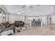 Open-concept living area featuring an eat-in kitchen, comfortable seating, and lots of natural light at 2822 E Hidalgo Ave, Phoenix, AZ 85040