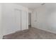 Comfortable bedroom features neutral carpet, closet with sliding doors, and great lighting at 2906 W Irma Ln, Phoenix, AZ 85027
