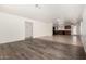 Spacious living room showcasing hardwood flooring, neutral walls, and backyard views at 2906 W Irma Ln, Phoenix, AZ 85027