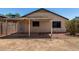 Outdoor patio area with awning, covered overhang, and ample space for entertaining at 2906 W Irma Ln, Phoenix, AZ 85027