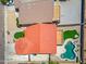 Aerial of backyard featuring a private pool and deck with verdant landscaping at 2909 W Bowker St, Phoenix, AZ 85041