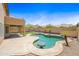 Inviting pool with lush landscaping, palm trees, and comfortable seating at 2909 W Bowker St, Phoenix, AZ 85041