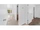 Hallway leading to the living area, showcasing the home's open floor plan and natural light at 2909 W Bowker St, Phoenix, AZ 85041