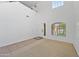 Sun-filled living area boasting high ceilings, large windows, and neutral tones at 2909 W Bowker St, Phoenix, AZ 85041