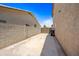 Concrete side yard with block wall at 2909 W Bowker St, Phoenix, AZ 85041