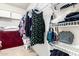 Walk-in closet with lots of hanging storage, wire racks for folded clothes, and a bright and organized space at 30266 N Royal Oak Way, San Tan Valley, AZ 85143