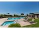 Community pool with sun loungers, gazebo, and a separate spa area at 30266 N Royal Oak Way, San Tan Valley, AZ 85143