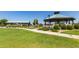 Well-maintained green space with gazebo and picnic tables in the community park at 30266 N Royal Oak Way, San Tan Valley, AZ 85143