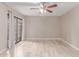 Bedroom featuring a ceiling fan, natural light and wood-look flooring at 3119 W Cochise Dr # 111, Phoenix, AZ 85051