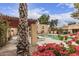 Community pool area with shade structure and attractive landscaping at 3119 W Cochise Dr # 111, Phoenix, AZ 85051