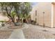 Well-maintained apartment complex features mature landscaping, walkways and wooden staircases at 3119 W Cochise Dr # 111, Phoenix, AZ 85051