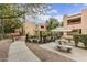 Community courtyard with stone benches and picnic area at 3119 W Cochise Dr # 111, Phoenix, AZ 85051